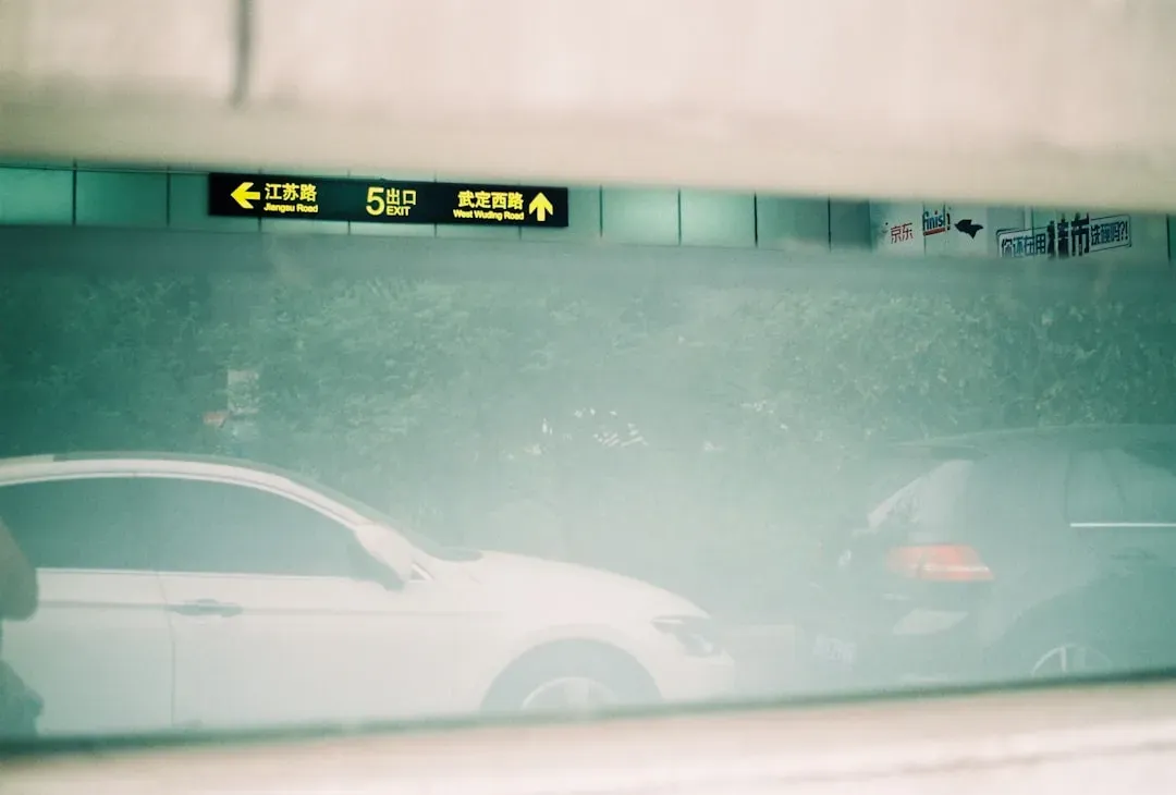 Digital air quality monitor displaying real-time readings on a home shelf, helping renters improve air quality without landlo