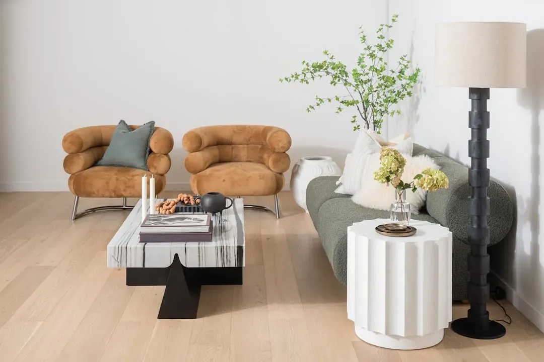 Modern air purifier running in sunlit living room demonstrating clean air circulation benefits for health and home wellness